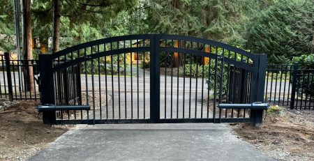 Black arched automated gate installed in Bellevue by Fences & Gates Pro and Custom Railings WA