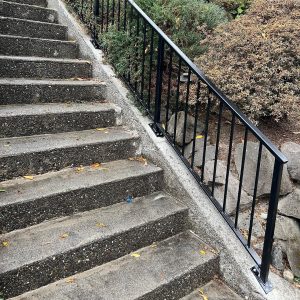 Exterior stair railing system installed for outdoor steps