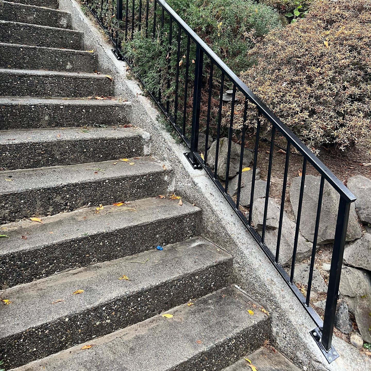 Exterior stair railing system installed for outdoor steps