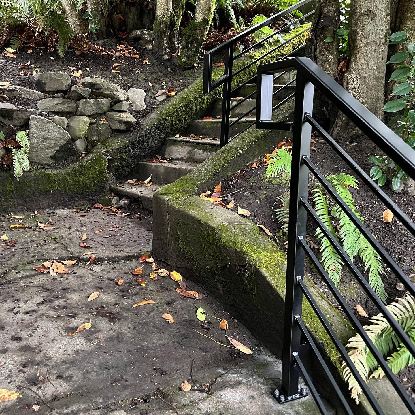 Exterior railing installation with modern metal fabrication