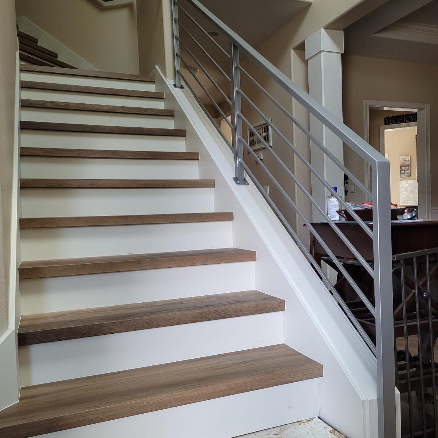 Contemporary gray stair railings with horizontal bars and clean square posts in Maple Valley, WA