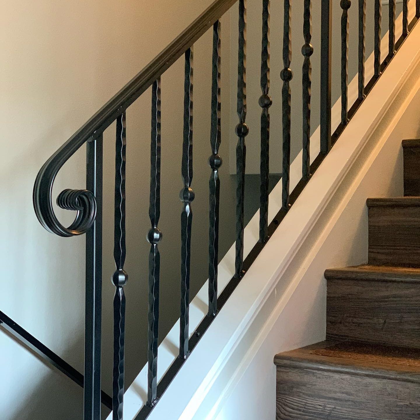 Interior staircase railing system with modern metalwork